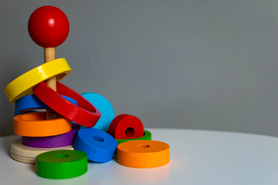 Blue green yellow and red plastic toy