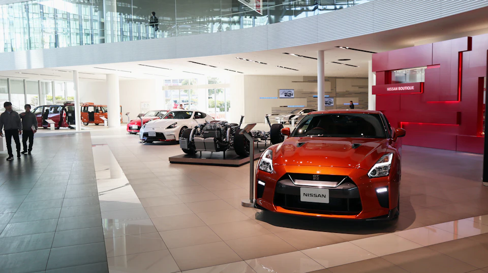 A car showroom filled with lots of cars